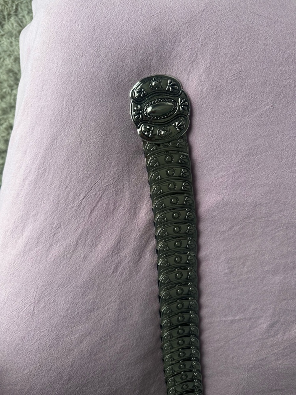 Black Embossed Stretch Belt with Decorative Oval Buckle